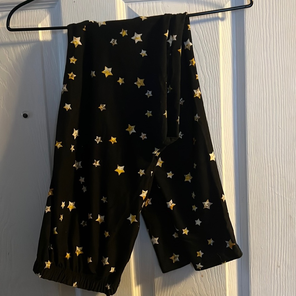 Agnes & Dora size large black leggings with gold stars
